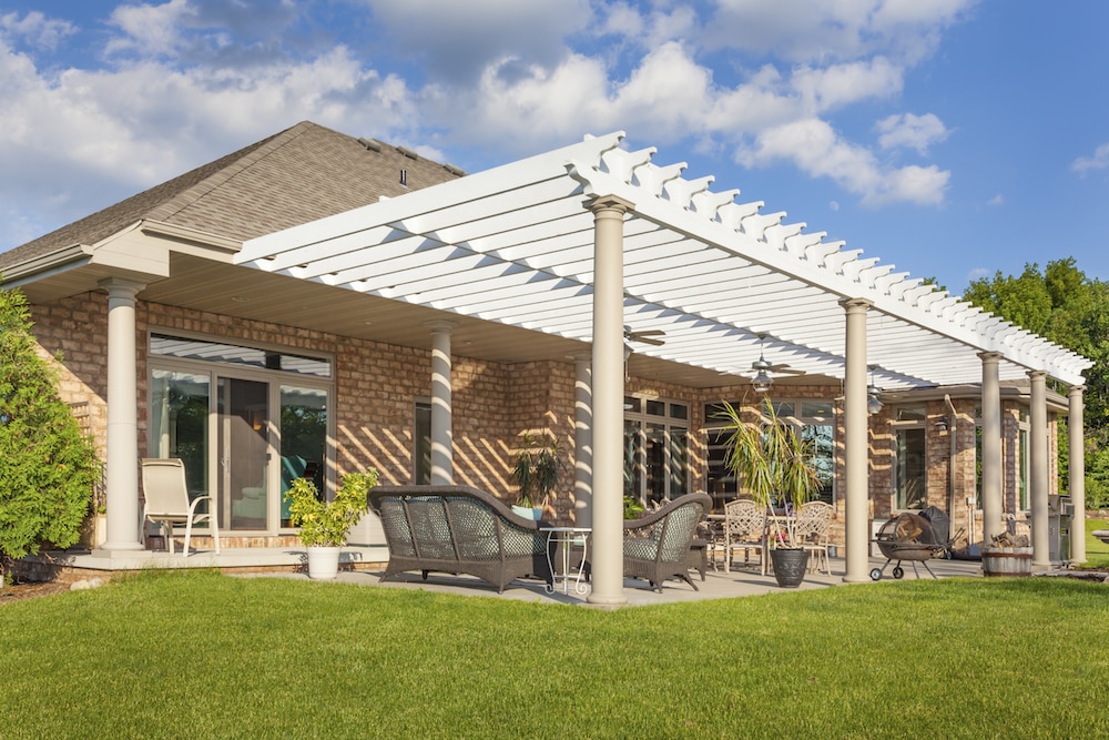 Elegant pergola design enhancing an outdoor space with stylish structure and comfortable seating